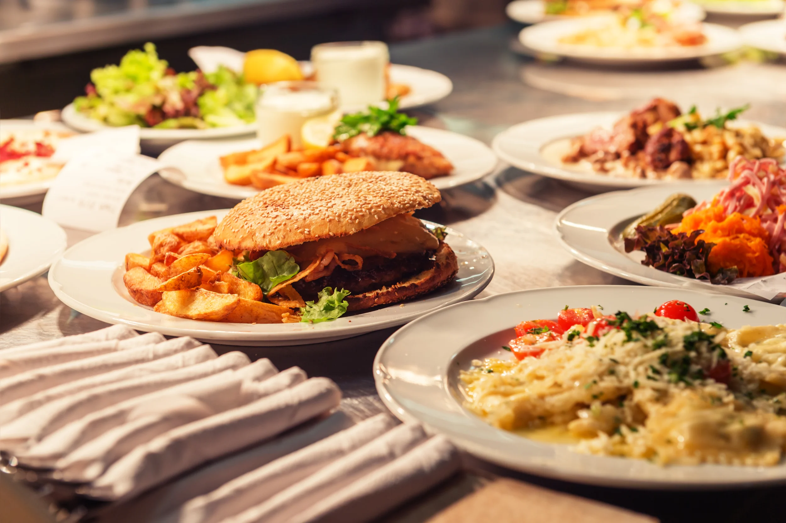 A variety of plated meals at a restaurant